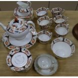 An Imari style teaset and a cup and saucer