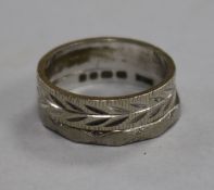 Two 18ct white gold wedding bands with engraved decoration.From the estate of the late Sheila