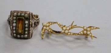 A Victorian yellow metal and seed pearl swallow brooch and an early 19th century gem set and split