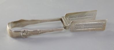 A pair of George IV silver hourglass pattern asparagus servers, by William King, London, 1824,