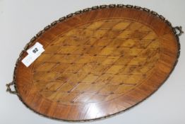 An early 20th century ormolu mounted parquetry tray, 50cm