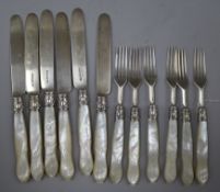 A set of six pairs of Victorian mother of pearl handled silver dessert eaters by John Gammage,