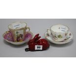 A Meissen floral painted cup and saucer, a Dresden two handled cup and saucer and a Royal Doulton