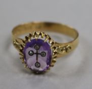 A Victorian 22ct gold, amethyst and diamond set ring, with inset cross motif (possible adaption?),