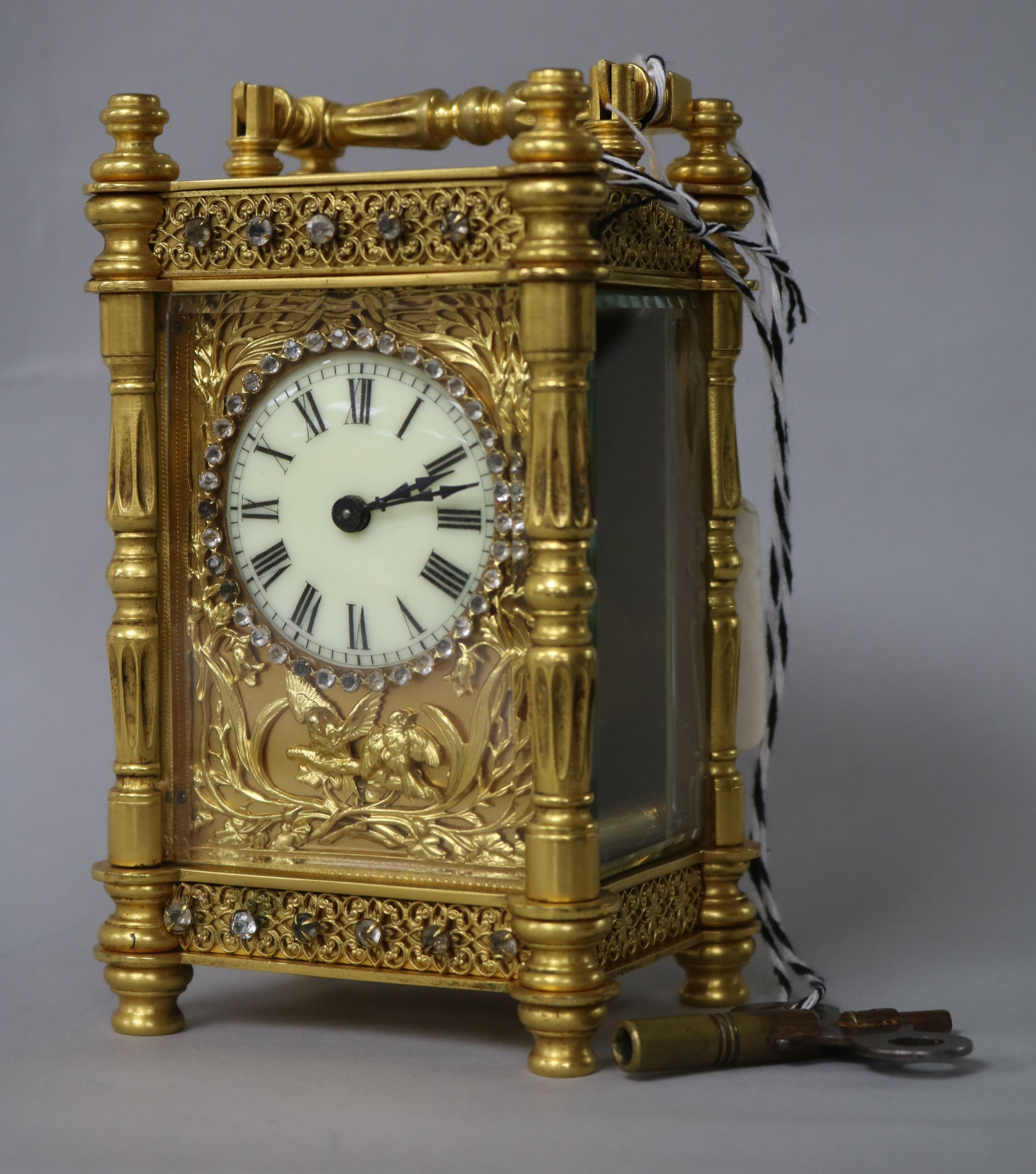 An Edwardian paste set lacquered brass carriage timepiece 13.5cm