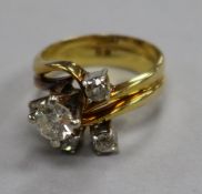 A yellow metal and five stone diamond cluster free form ring, size K.