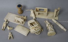 An Indian carved ivory bullock-drawn carriage, a similar litter with bearers and four other items,
