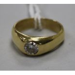 An 18ct gold and gypsy set solitaire diamond ring, size K.