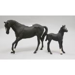 A Royal Doulton mare and foal largest 18cm.From the estate of the late Sheila Farebrother.