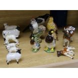 A collection of Beswick sheep, cows, ducks and birds