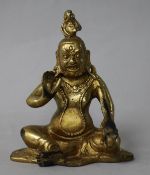 A gilt bronze seated figure of a deity
