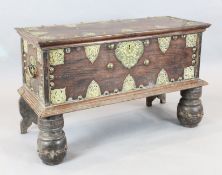 A 19th century brass mounted hardwood Zanzibar chest, with turned trestle feet, W.3ft 11in D.1ft