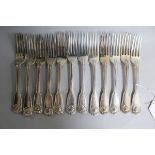 A harlequin set of twelve William IV silver fiddle, thread and shell table forks, 38 oz.