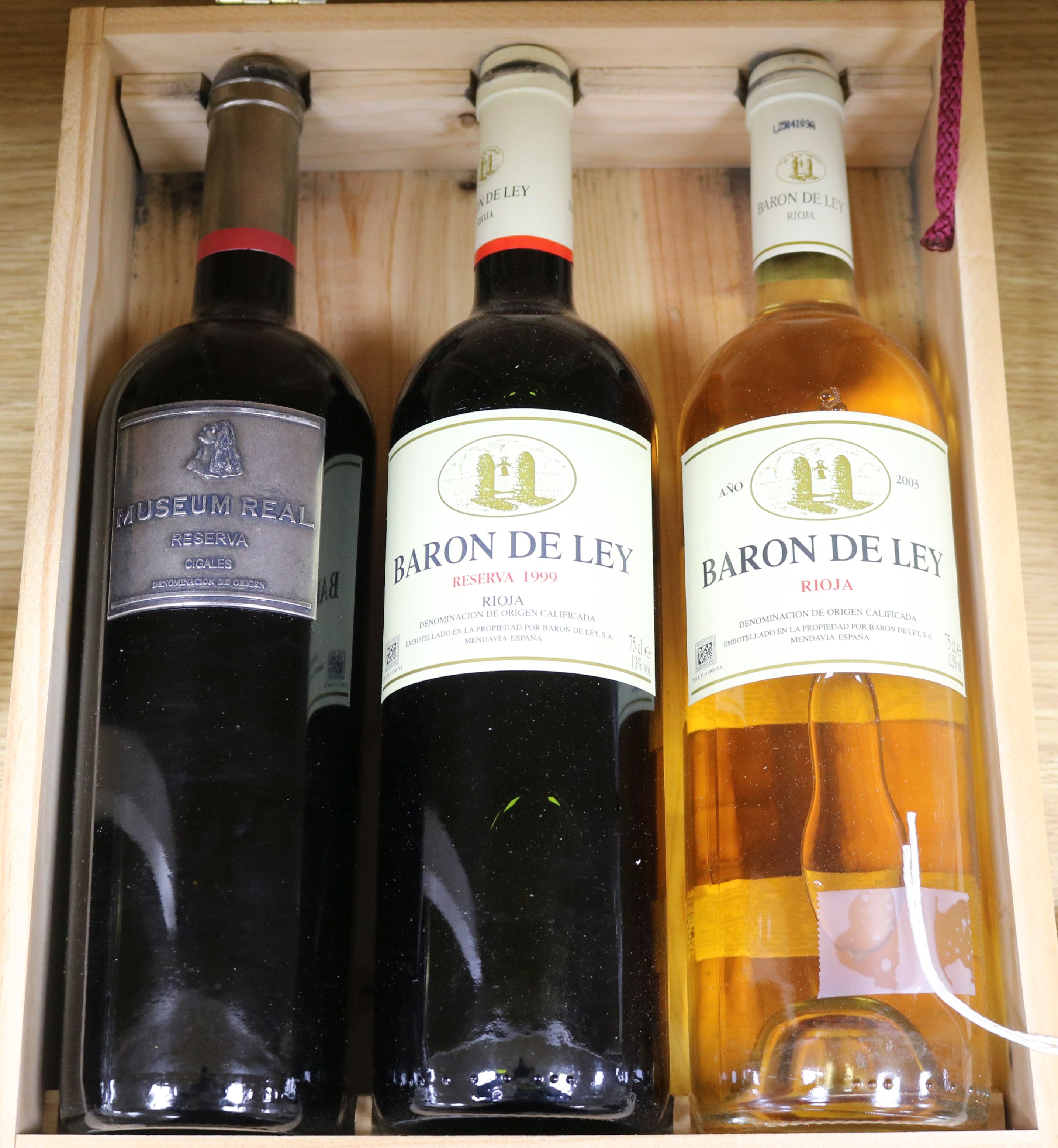 Three bottles of Baron de Ley Rioja in wooden presentation box, including Museum Real Reserva