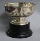 An Edwardian demi fluted silver rose bowl, on ebonised socle, diameter 18.3cm, 15.5oz.