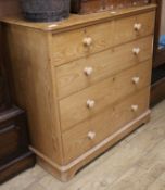 A pine chest of five drawers W.105cm