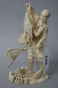 A Japanese ivory okimono of a fisherman