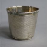 A French Cartier engine turned silver small beaker, 5cm, 1.9 oz.