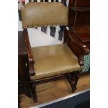 An English leather upholstered elbow chair