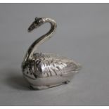 A continental white metal novelty pepperette modelled as a swan, 44mm.