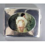 A George V silver cigarette case with later enamelled oval plaque of a lady on a windy day (with