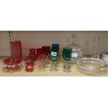 A collection of mixed cranberry glass and enamelled Stilton dish, etc.