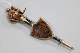 A Victorian Scottish gold and hardstone set sword and shield brooch, with engraved decoration, the