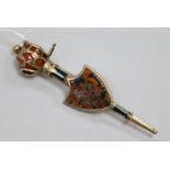 A Victorian Scottish gold and hardstone set sword and shield brooch, with engraved decoration, the