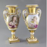 A pair of Paris gilt porcelain vases, decorated with Ganymede and Leda, the reverse with floral