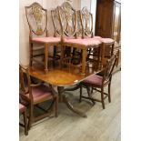 A set of eight Hepplewhite style mahogany dining chairs and a Regency style mahogany two pillar