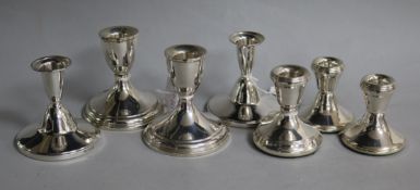 Three assorted pairs of late 20th century silver dwarf candlesticks, including Elkington & Co and
