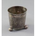 An 18th century Scandinavian? silver beaker, with textured body, on three ball feet, maker's mark TS