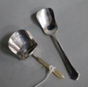 A Georgian silver caddy spoon, Joseph Wilmore, Birmingham, 1810 and a later 1930's silver caddy