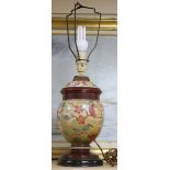 A Victorian floral and fruit painted pottery table lamp