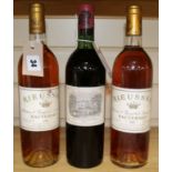 A bottle of Chateau Lafite Rothschild 1965 and and two bottles of Chateau Rieussec Sauternes Premier