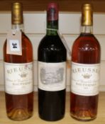 A bottle of Chateau Lafite Rothschild 1965 and and two bottles of Chateau Rieussec Sauternes Premier