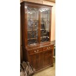 An Edwardian bookcase W.107cm