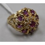 A 14ct gold, ruby & diamond cluster dress ring, size L.