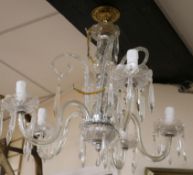 A cut and moulded glass four light chandelier drop 47cm