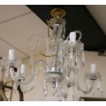 A cut and moulded glass four light chandelier drop 47cm