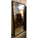 A Victorian ebonised framed overmantel W.108cm