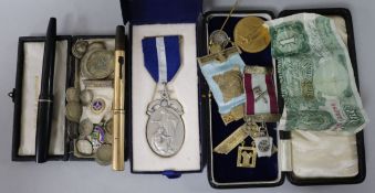 A quantity of mixed medals, coinage, pens etc
