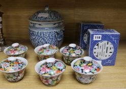 A set of six Chinese 'thousand flower bowls and covers, a blue and white Kamcheng and two blue and