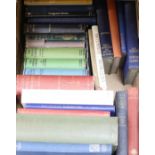 A box of mixed reference books