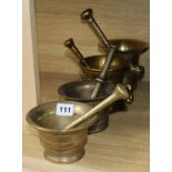 Four bronze mortars and pestles tallest 12.5cm