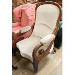 A Victorian mahogany scroll armchair