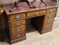 An Edwardian walnut pedestal desk W.122cm