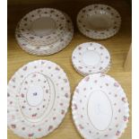 A Royal Doulton rose bud design part dinner service