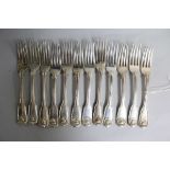 A harlequin set of twelve William IV silver fiddle, thread and shell dessert forks. 22.5 oz.