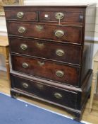 A George III oak chest on stand fitted two short drawers and four graduated long drawers, on bracket